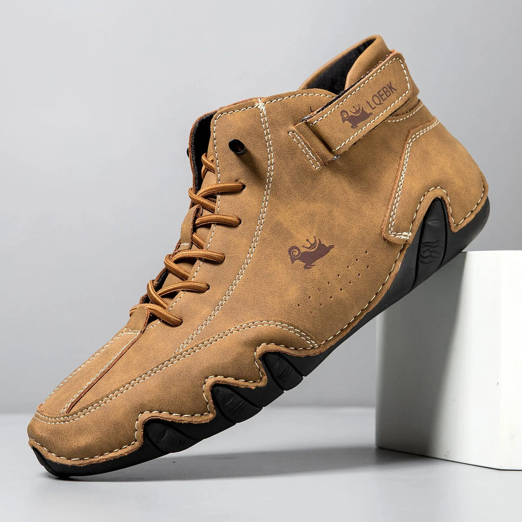 Men's brown high-top Octopus Martin boots with round toe, flat heel, and rubber sole