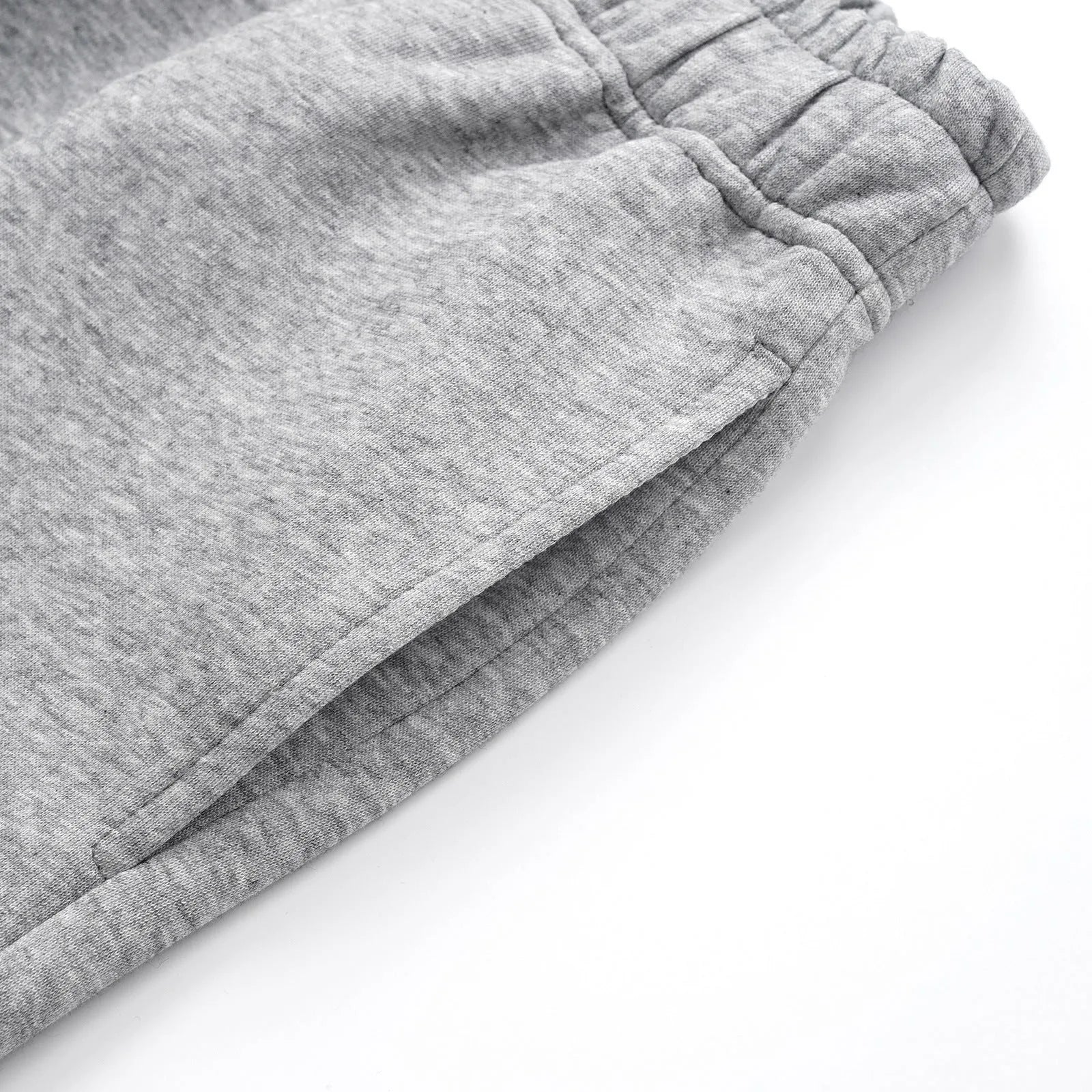 Men's grey straight-leg cotton trousers with elasticated waistband and loose casual fit