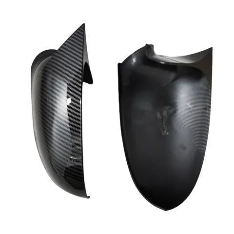 Bright black plastic mirror reflector shell pair for a Volkswagen Sagitar car.