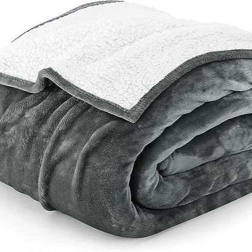 Light grey cotton electric heating blanket shown in a folded position, with adjustable temperature control for use as a blanket or hot compress pad.