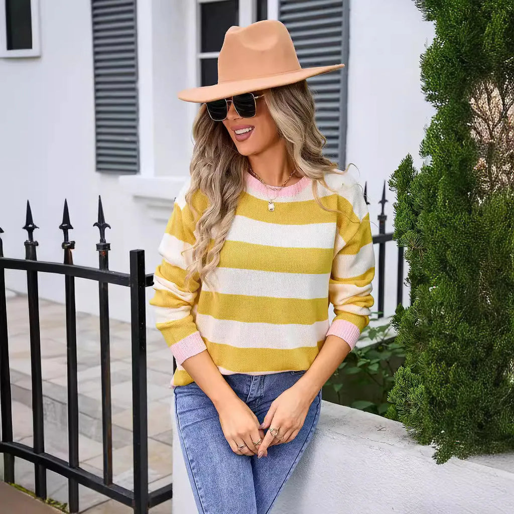 Women's loose-fit long sleeve acrylic sweater with round neck in striped or plaid pattern