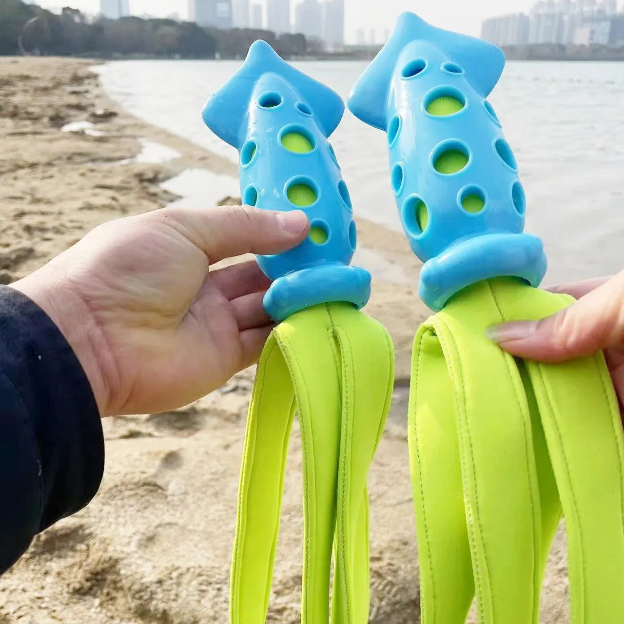 Blue cuttlefish-shaped dog chew toy approximately 39cm long with rubber and waterproof cloth construction