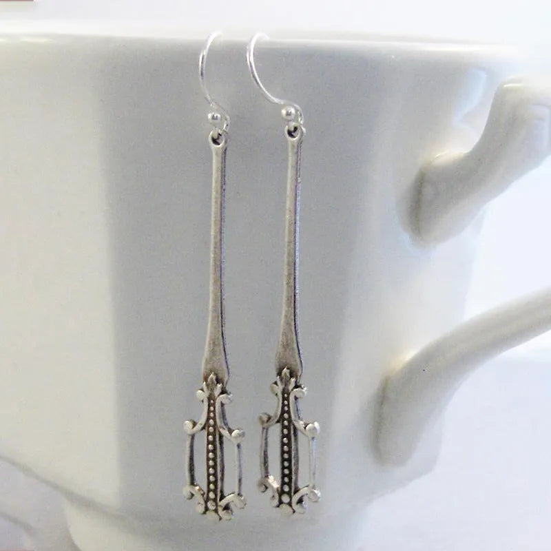 Silver retro geometric alloy earrings for women with electroplated finish, one pair