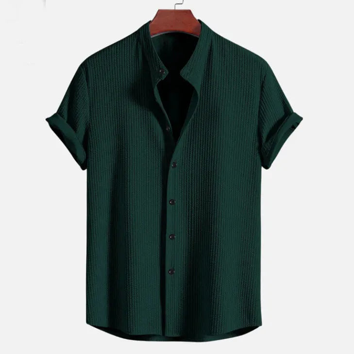 Men's loose fit short sleeve shirt in polyester fibre, available in nine colours including wine red and navy blue