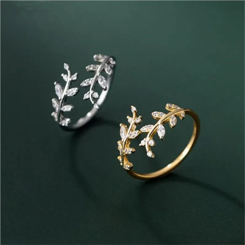 Copper leaf branch fashion ring for women with electroplated gold or silver finish.