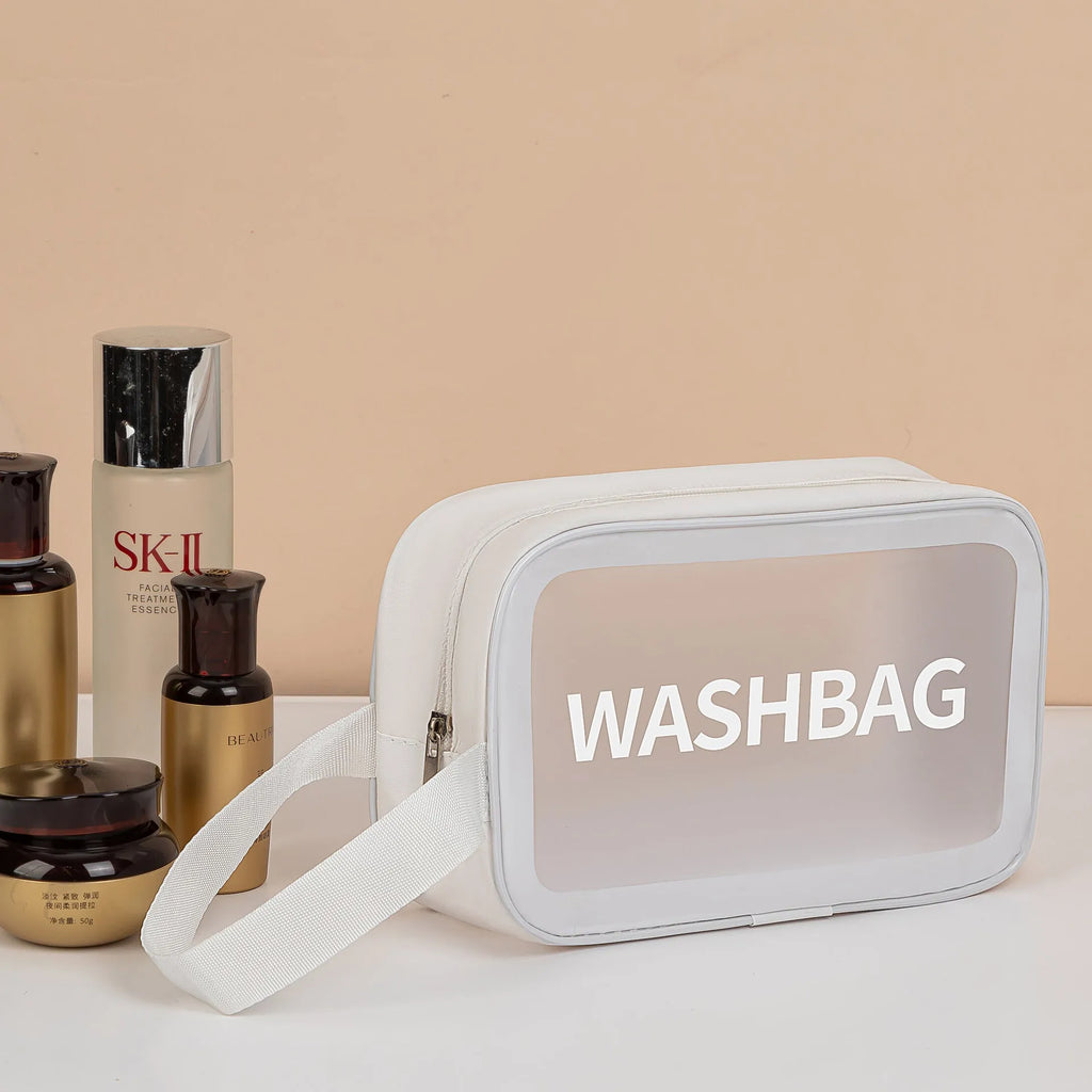 Three-piece PVC wash bag set in transparent beige, white, black, pink and blue with large, medium and small sizes