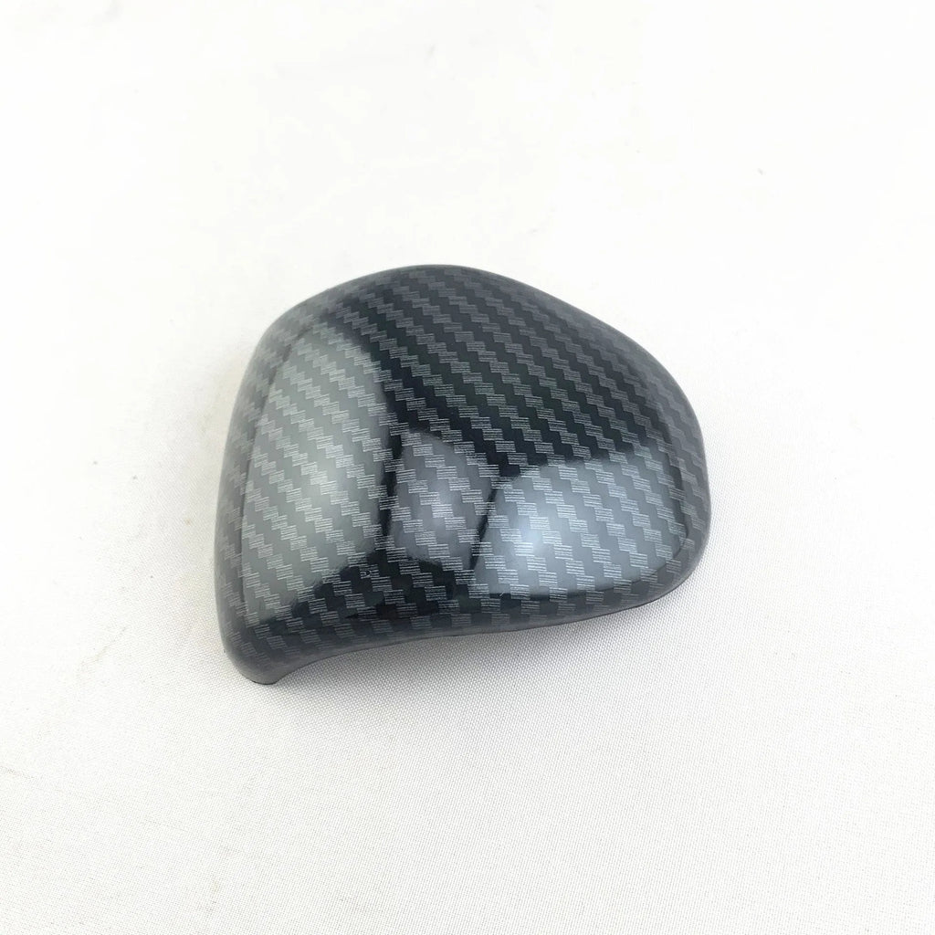 Carbon fibre pattern gear shift cover measuring 8cm diameter by 2cm height for automotive interiors