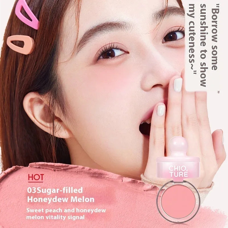 Compact of shimmer powder blush mud in nude shades including Oxygenated White Peach.