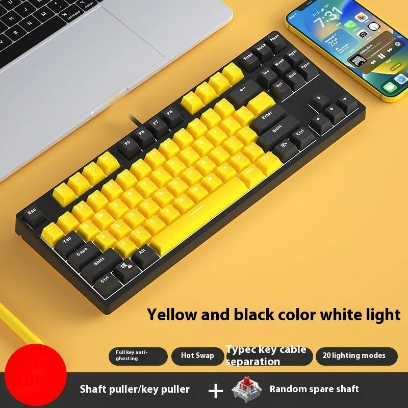 87-key wired mechanical keyboard with two-tone keycaps and metal frame, showing compact design and included tools