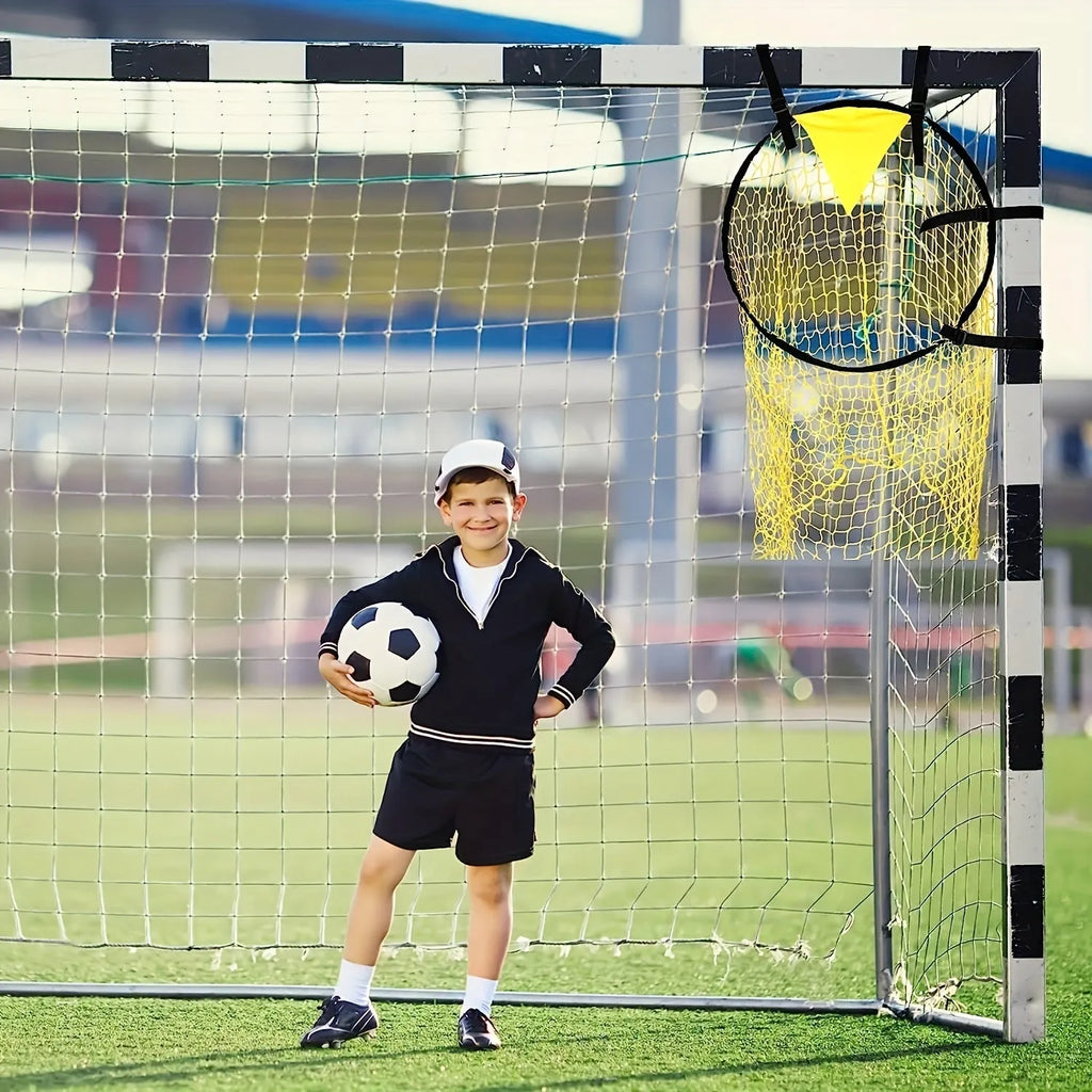 Portable aluminium frame soccer training goal net set up on grass
