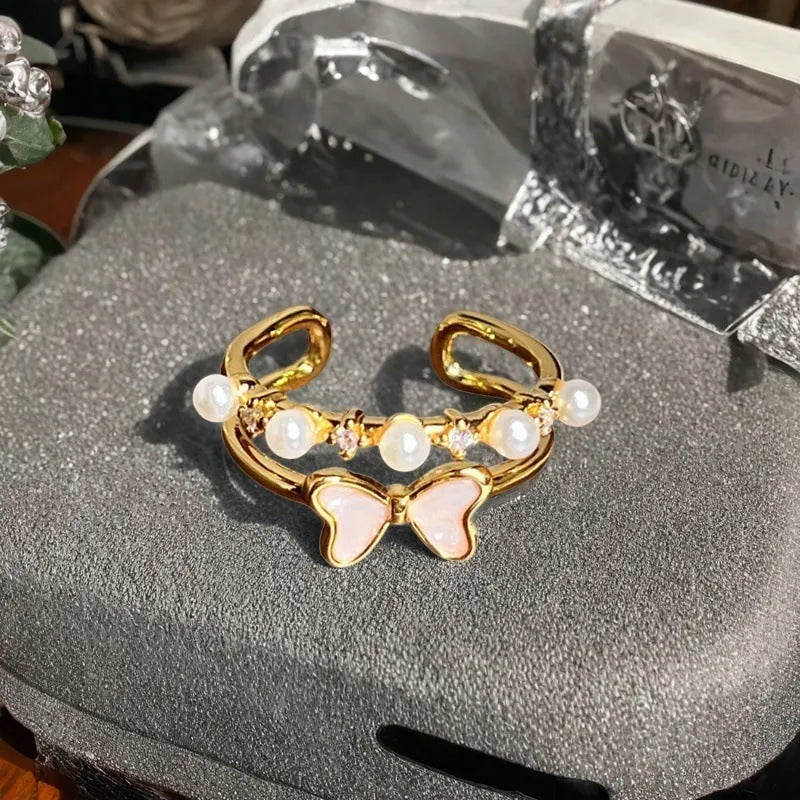 Adjustable copper ring with vintage oil-dripping gourd design, inlaid zircon stones, and flower and bow shapes in New Chinese style