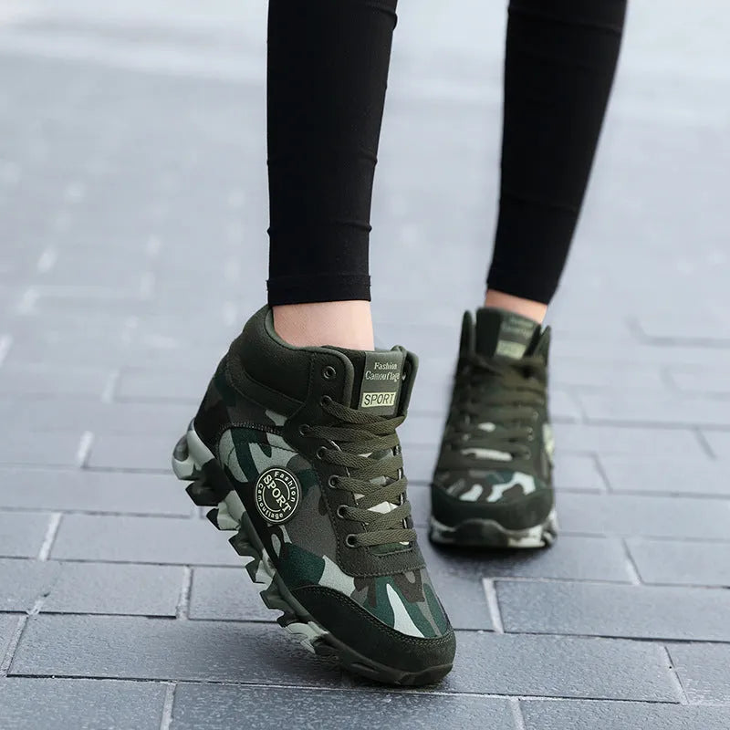 Women's green camouflage canvas sneakers with rubber sole, shown in casual setting