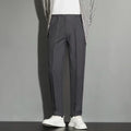 Men's straight-leg suit trousers with spring draping effect in apricot colour, showing waist to ankle design