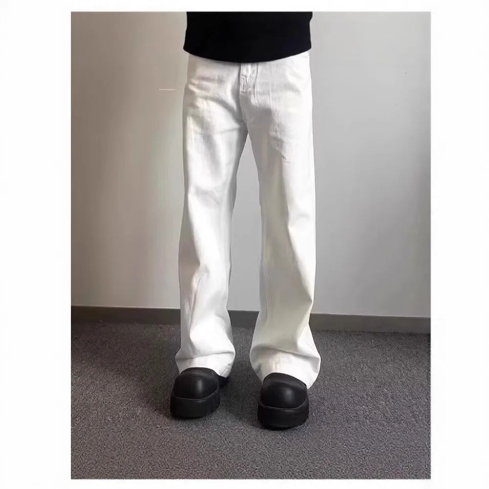 Men's straight-leg white jeans with mid-waist and zipper fly, displayed on a hanger