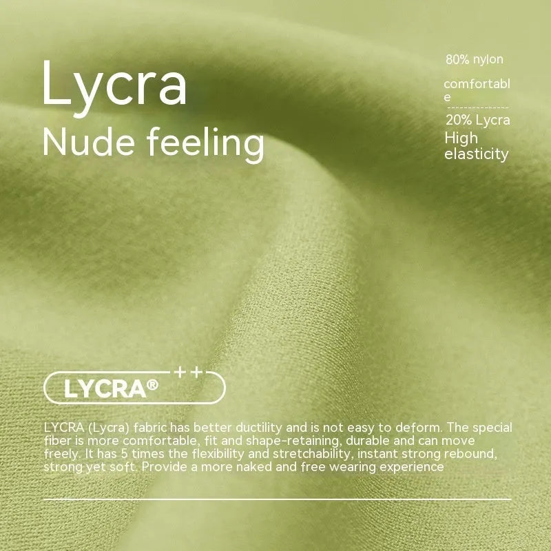 Women's high-waisted lycra yoga shorts in leaf green for fitness.