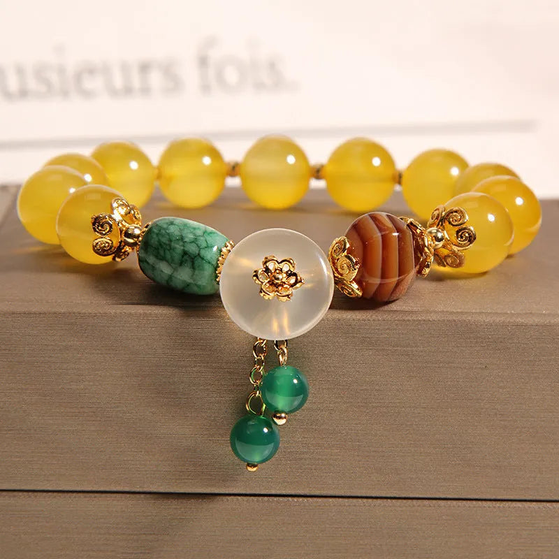 Yellow agate crystal bracelet for women with adjustable 18-22cm length in khaki colour and gold silk