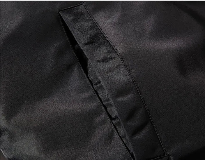 Men's solid pilot jacket in green or black, 100% polyester with long sleeves and ribbed bottom hem