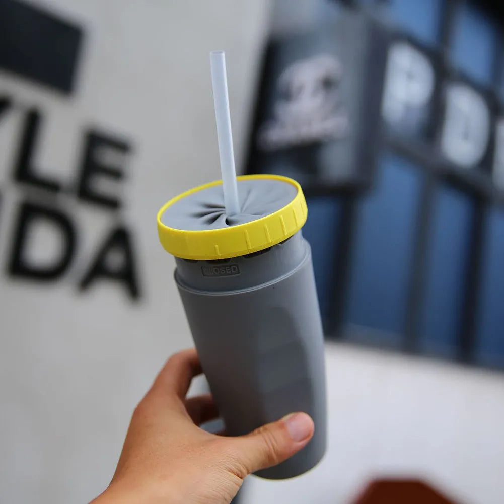 Double insulation travel tumbler with twist-top silicone seal showing cartoon patterns