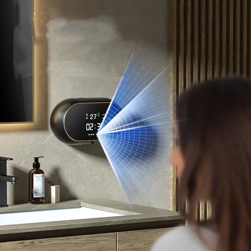 White automatic hand sanitizer dispenser mounted on wall with infrared sensor and USB charging port visible