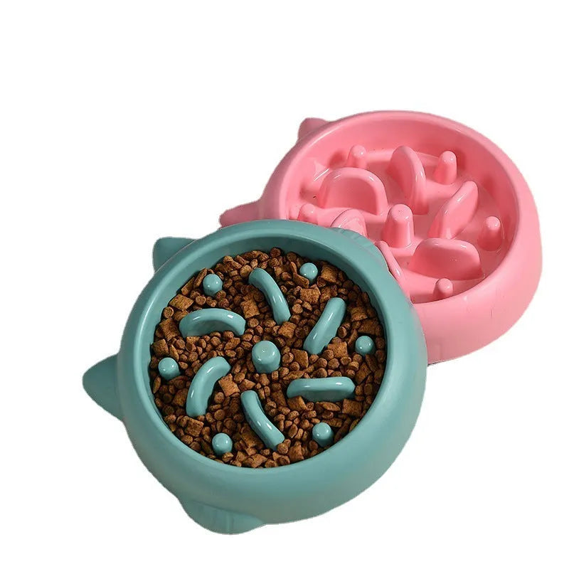 Green bone-shaped slow feeder dog bowl with raised ridges to prevent fast eating.