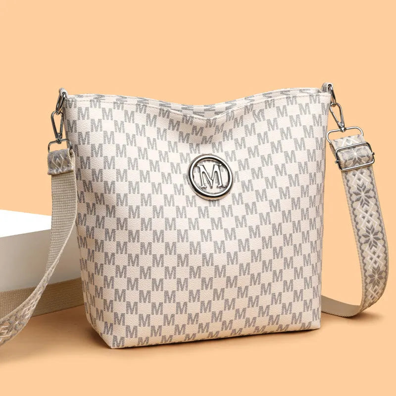 Retro dumpling-shaped PU shoulder bag in black, brown, or white with zipper change pocket