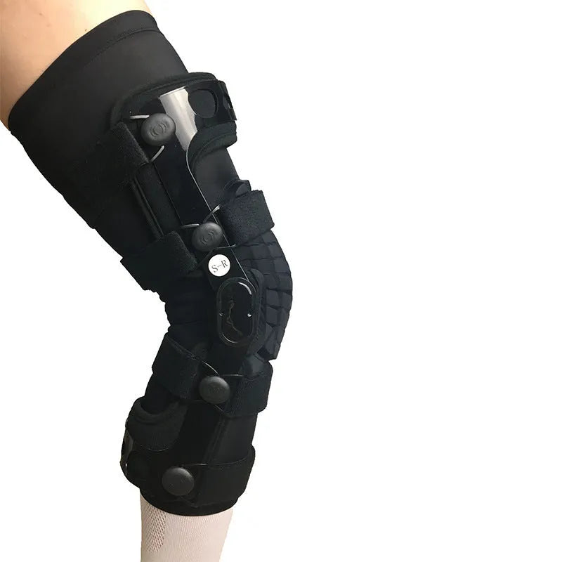 Black anterior ligament knee pad with adjustable straps, showing brushed cloth interior and sandwich fabric construction