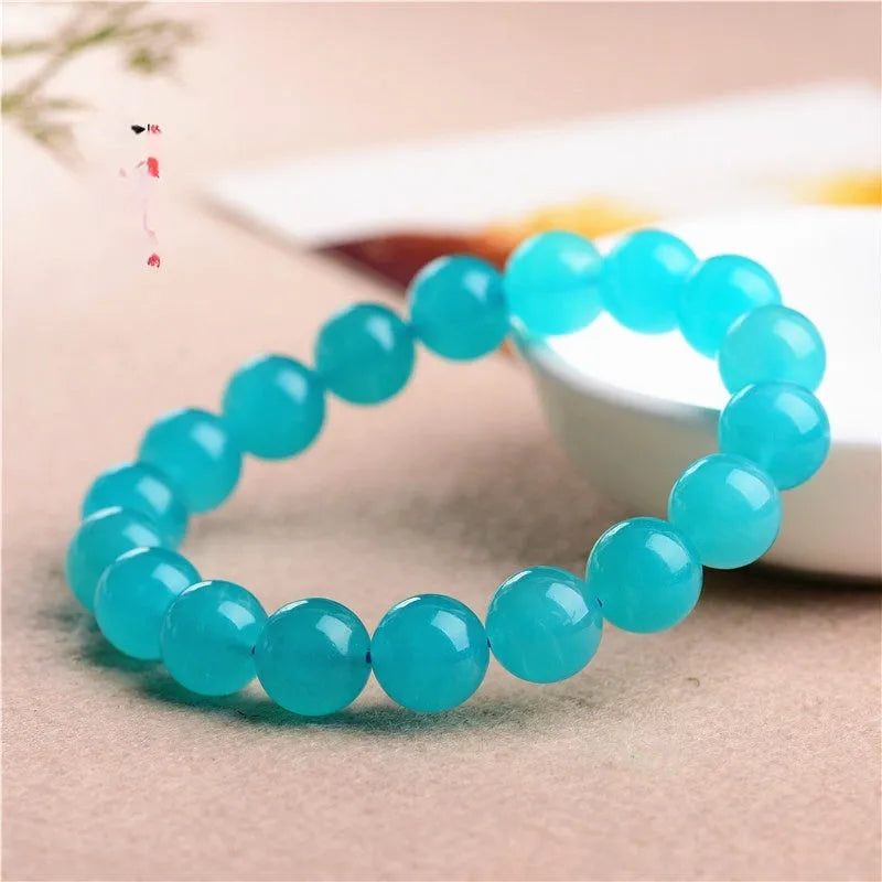 Grade 7A Amazonite scattered beads showing blue-green natural gemstone with polished surfaces for jewellery making