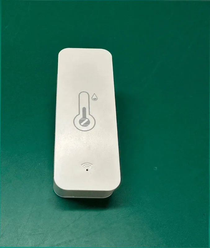 White rectangular WiFi Zigbee temperature humidity sensor measuring 72mm by 25mm by 20mm