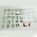 Metal zinc alloy car bumper stickers showing 3D English letters in black and silver finishes, each measuring 2.5cm