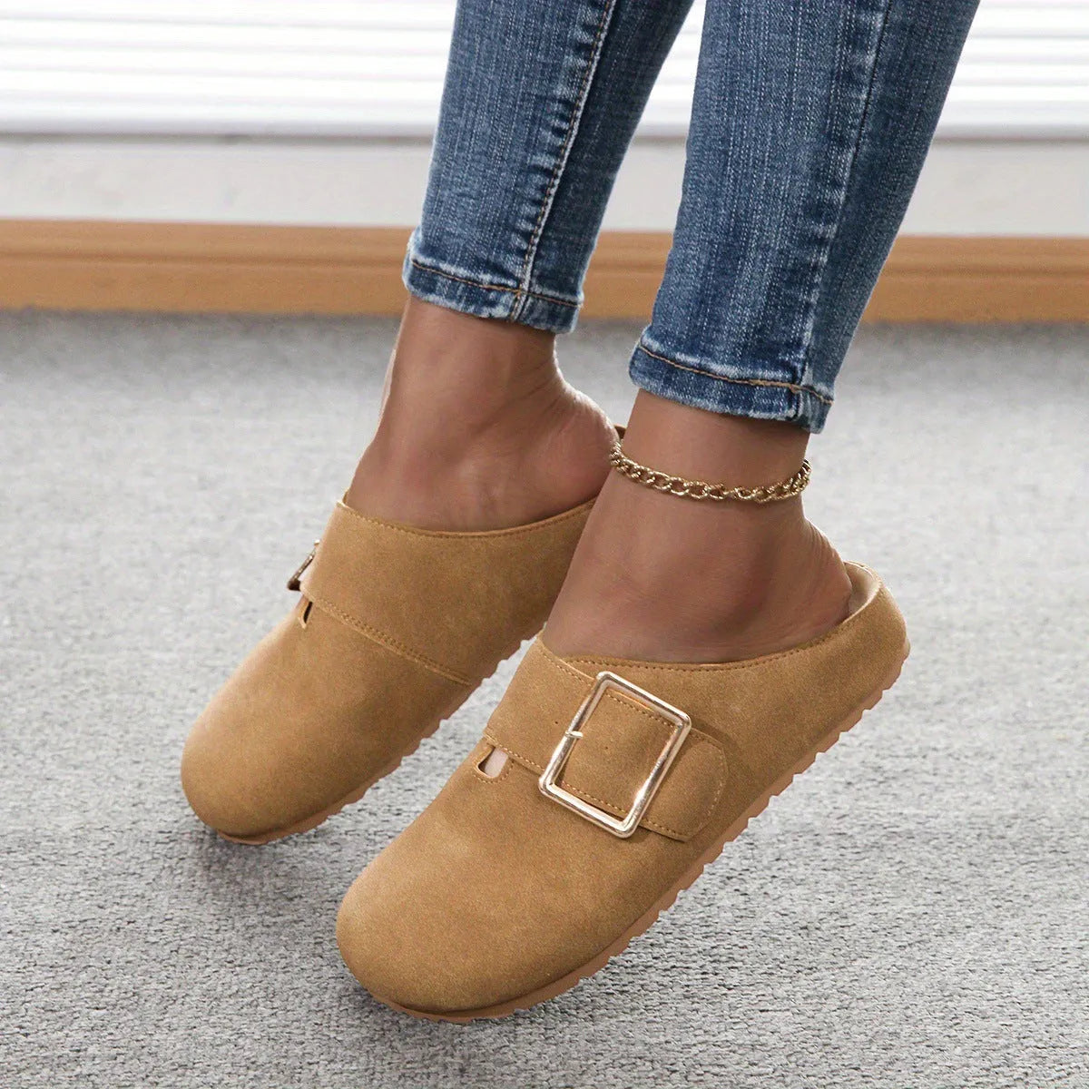 Women's low-top canvas slippers in apricot colour with closed toe and cushioned sole.
