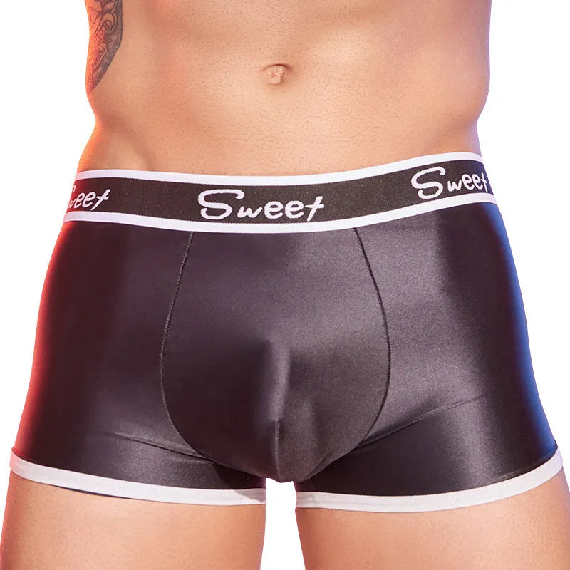 Men's shiny silky nylon boxers in black, white, and sapphire blue colours.