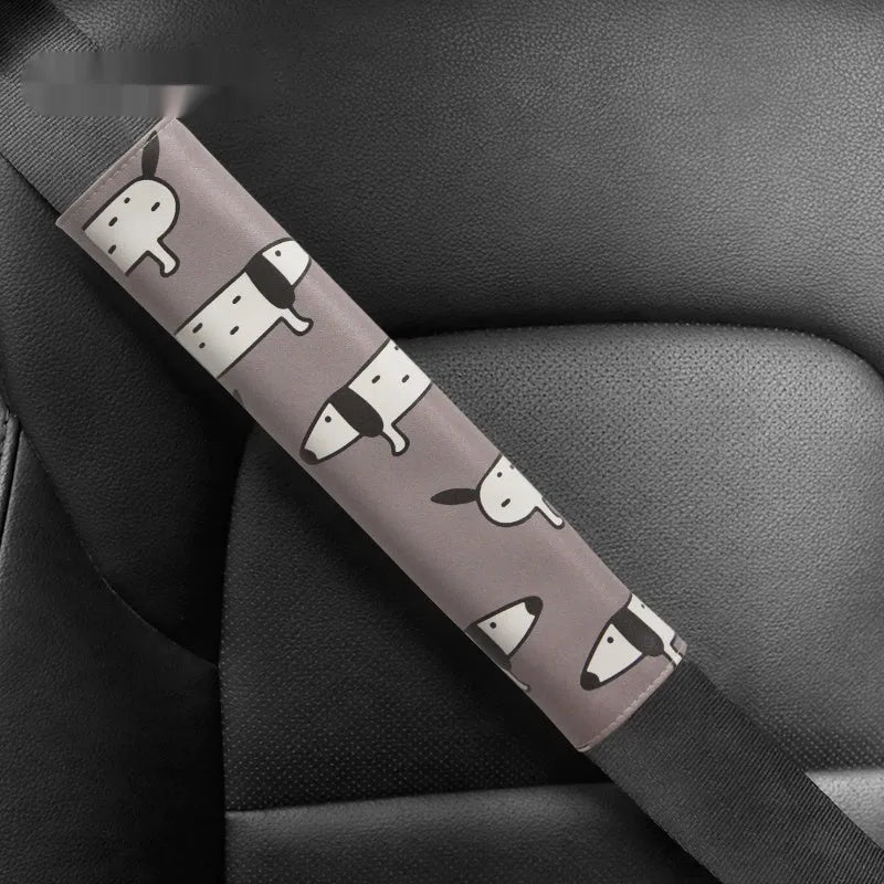 PU leather car seat belt shoulder pad with Dachshund cartoon design, 14cm by 22cm.