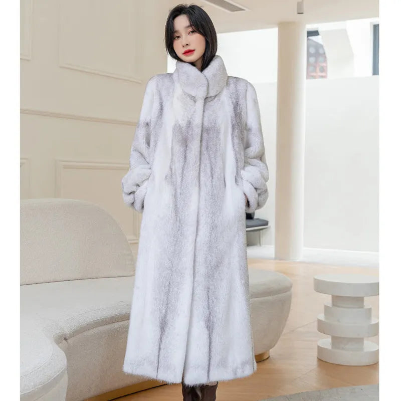 White women's faux fur coat with a stand-up collar, shown full-length.