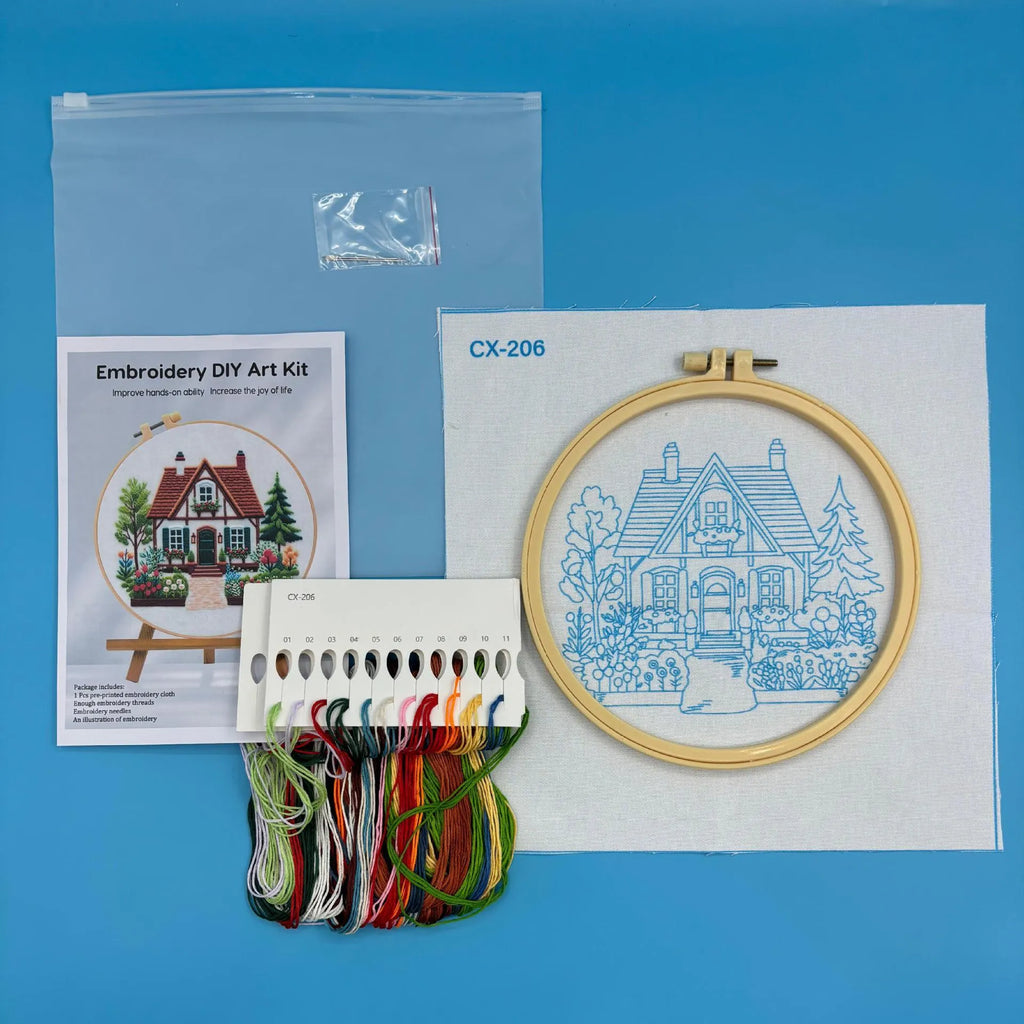 Garden Cottage embroidery fabric kit showing 28x28cm cotton linen cloth with landscape pattern