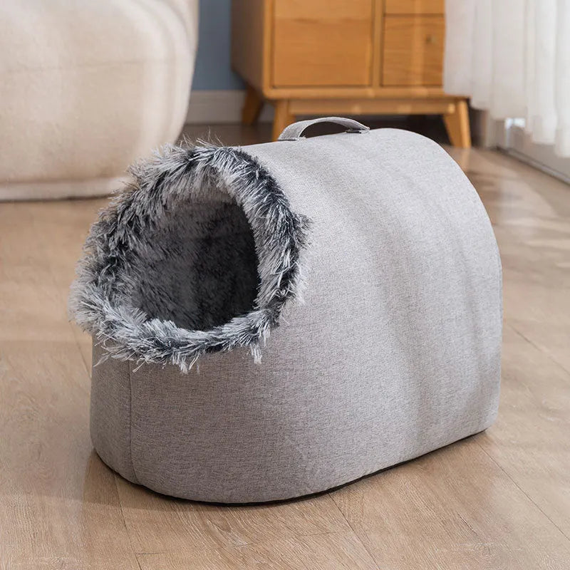 Grey fleece-lined closed cat nest sleeping bag showing enclosed design and soft cloth exterior