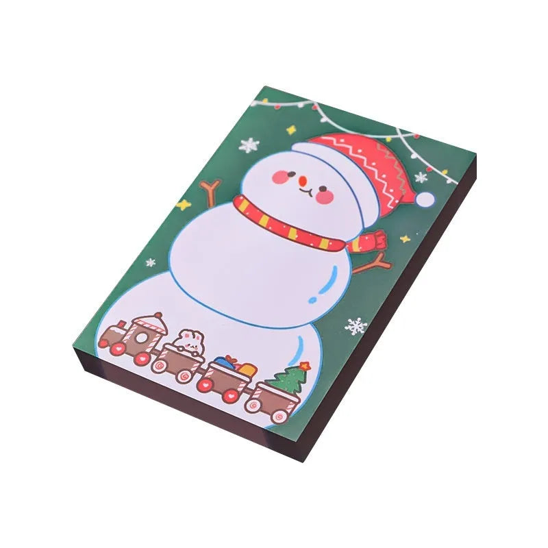 Christmas sticky notes book with eight festive designs including Santa bear elf gift house sled snowman crystal ball
