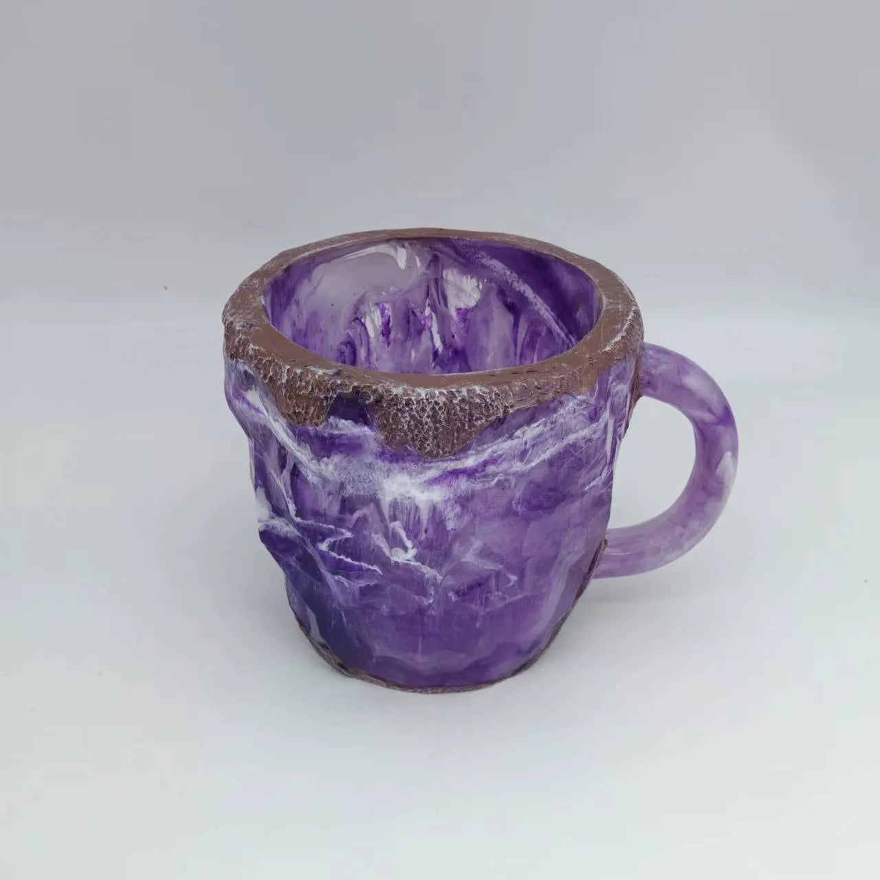 Resin mineral crystal coffee mug with 400ml capacity and 3D crystal structure in purple colour