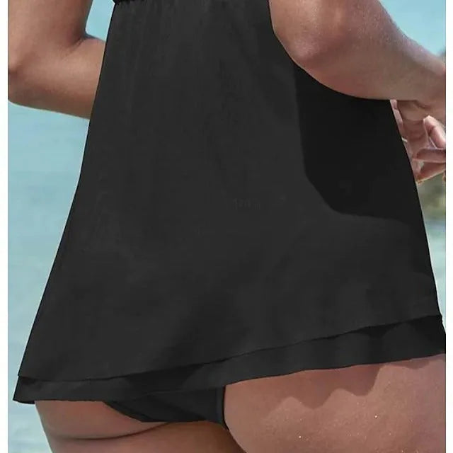 Women's strapless one-piece swimsuit in a solid colour, shown in available shades.