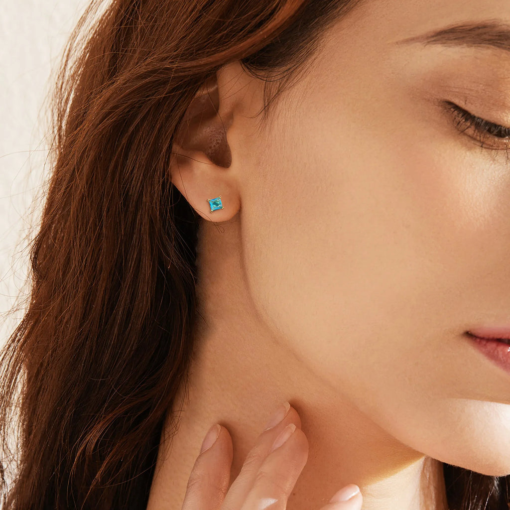 Brass gold-plated drop-shaped earrings with pear-shaped zircon stones in candy colours on copper base