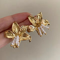 Gold H1795 metal pearl flower earrings with exaggerated floral design for women