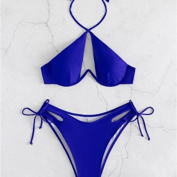 Women's brown halter-neck bikini set with backless top and briefs bottom on a mannequin