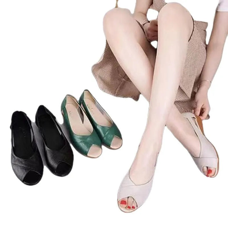 Women's black casual peep toe sandals with an ankle buckle and rubber sole, showing fish mouth toe shape.