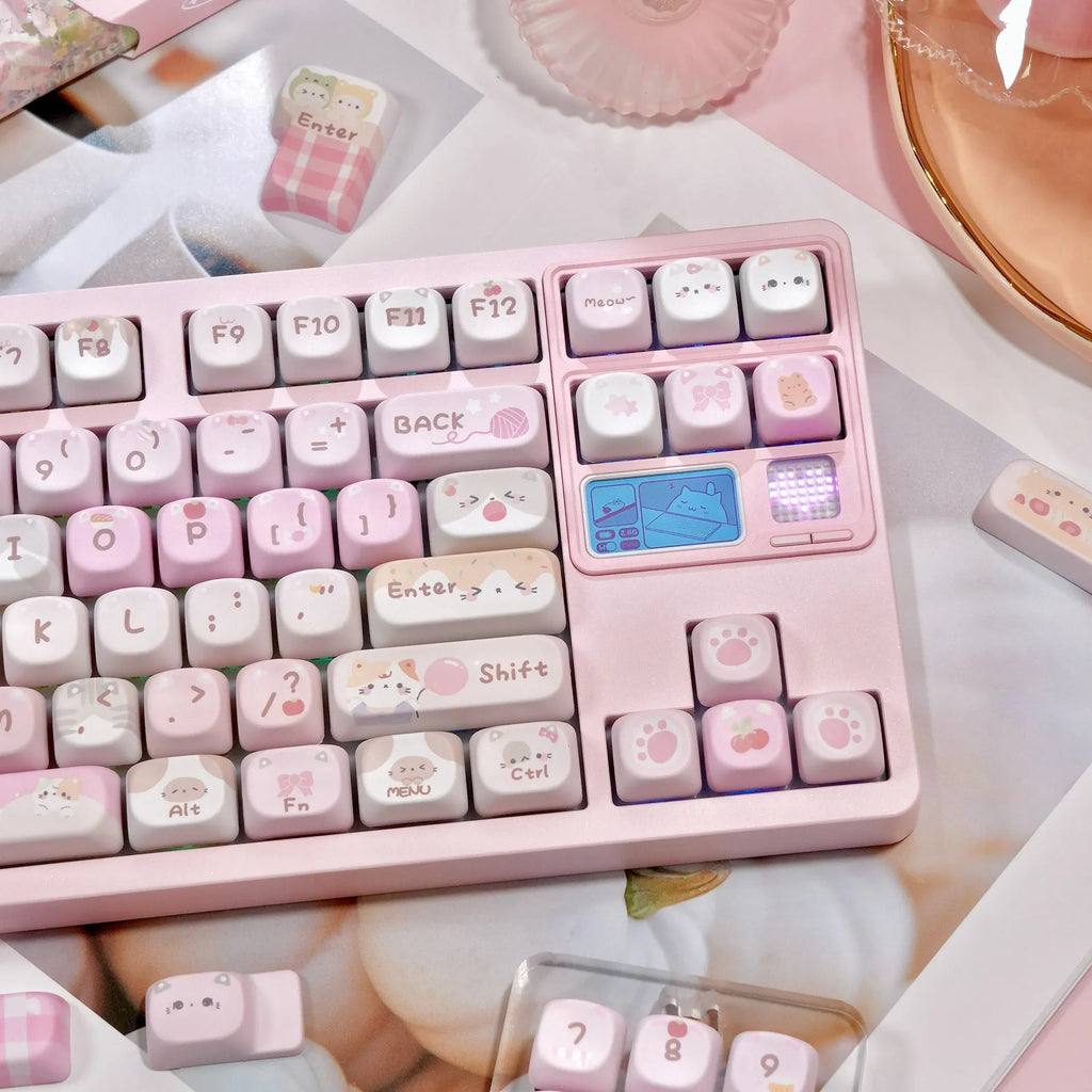 Pink MOA height keycaps with cartoon designs on all five sides for mechanical keyboard customisation