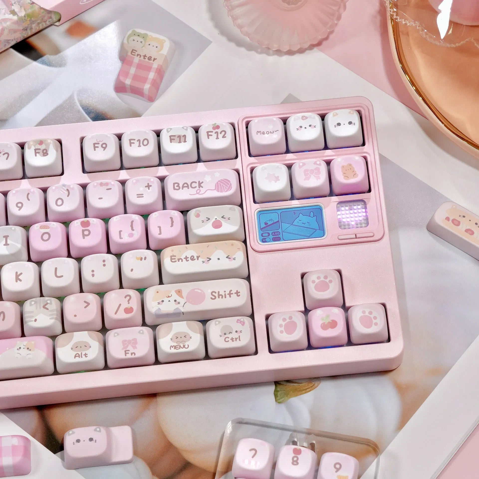 Pink MOA height keycaps with cartoon designs on all five sides for mechanical keyboard customisation