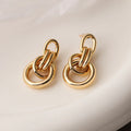 Gold geometric irregular-shaped earrings for women made from copper material