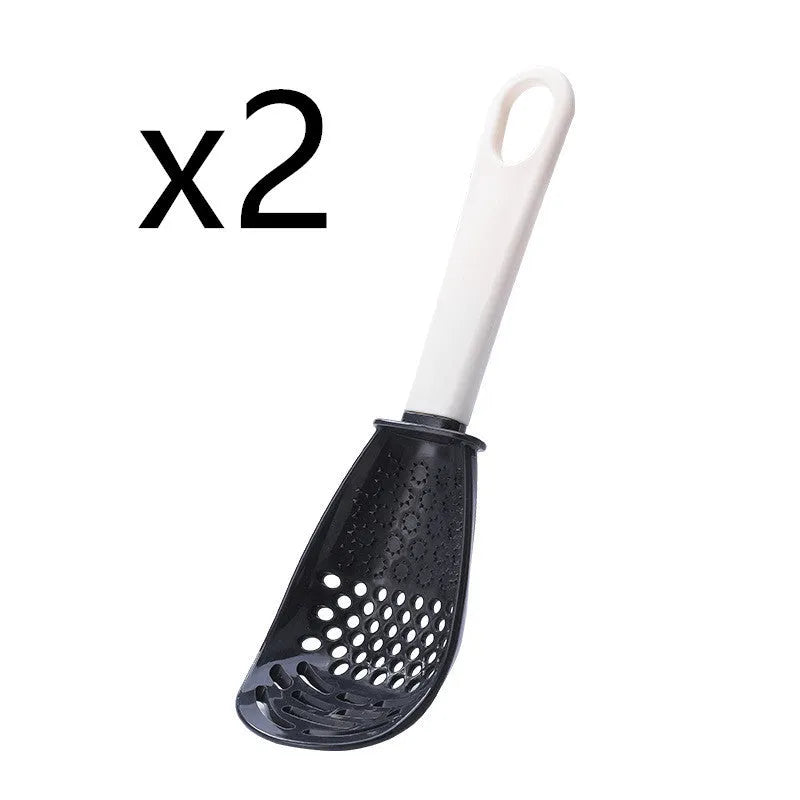 Red and black multifunctional slotted spoon with grinding serrations and half-enclosed head for kitchen use