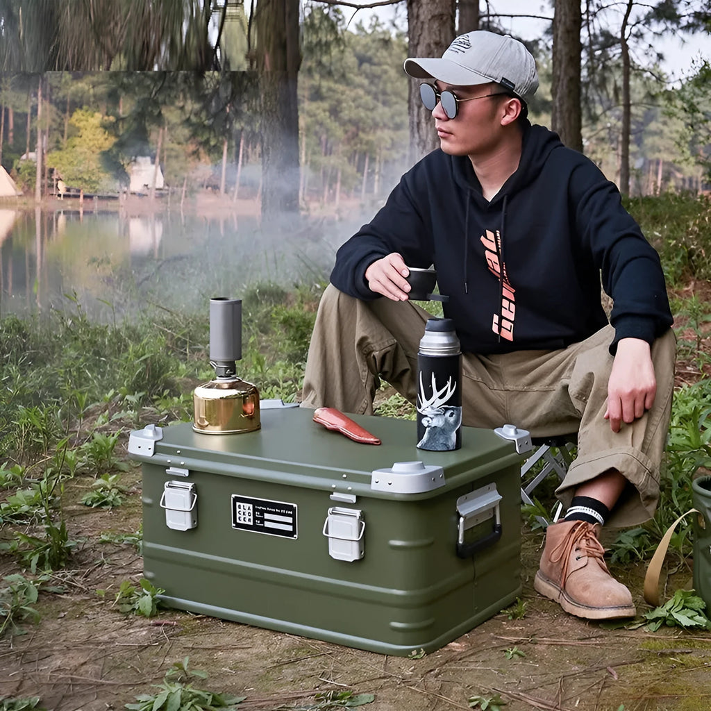Field green aluminium alloy outdoor storage box with dimensions 58cm by 38cm by 28cm.