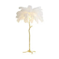 Decorative resin feather floor lamp standing 170cm tall with 32 individual feathers in choice of colours