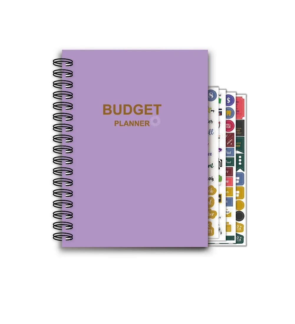 Purple coil-bound financial planning notebook open on a monthly budget page with pen and stickers.