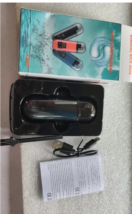 Rechargeable nose hair trimmer with digital display and removable cutter head